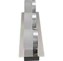 Vägglampa med tre lampor i metall och glas