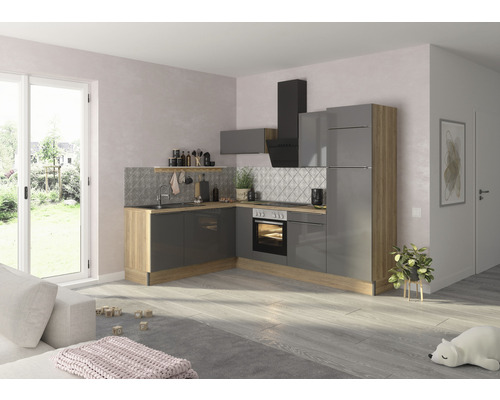 Modernt kök med grå skåp och trästruktur