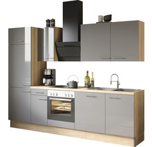 Köksdel med inbyggda apparater och grå fronter