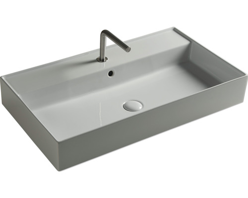 Rektangulär keramisk tvättställ med kran