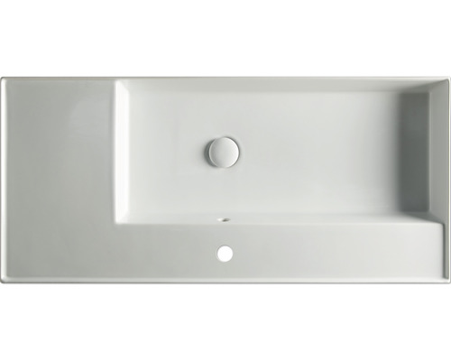 Vy ovanifrån på ett rektangulärt tvättställ med översvämningsskydd