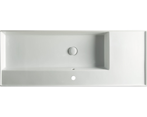 Toppvy av ett rektangulärt handfat med kranhål och överfyllnadsskydd