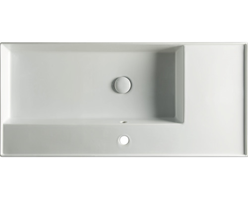 Ovanifrån vy av ett rektangulärt tvättställ med förvaringsutrymme