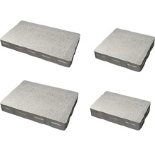 Fyra betongstenar med distansbrickor