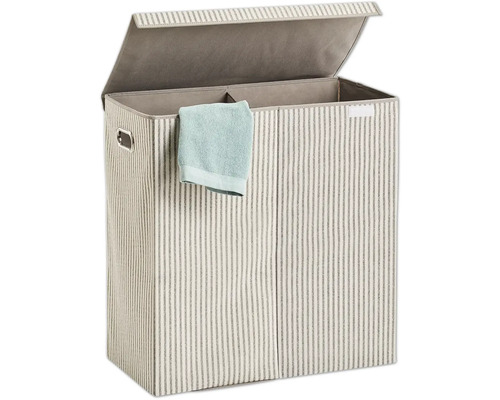 Öppen tvättkorg med lock och randigt mönster