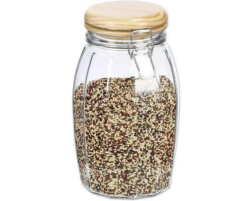 Glasbehållare med trälock och klämma, fylld med quinoa