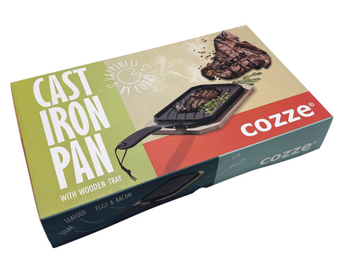 Förpackning av en Cozze gjutjärnspanna med träbricka