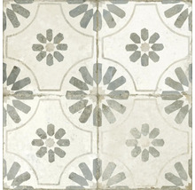 Dekorativa golvplattor med geometriska och blommiga mönster