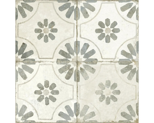 Dekorativa golvplattor med geometriska och blommiga mönster