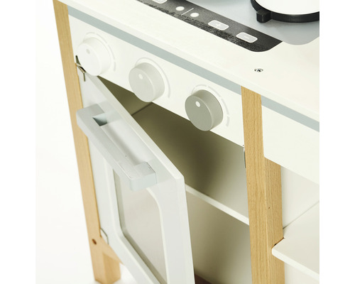 Leksakskök med öppen ugnslucka och vridknappar