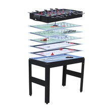 Multifunktionellt spelbord med olika spelplaner för bordsfotboll, schack, backgammon, biljard, hockey med mera.