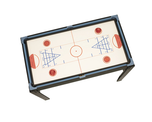 Airhockeybord med spelmarkeringar och puckar