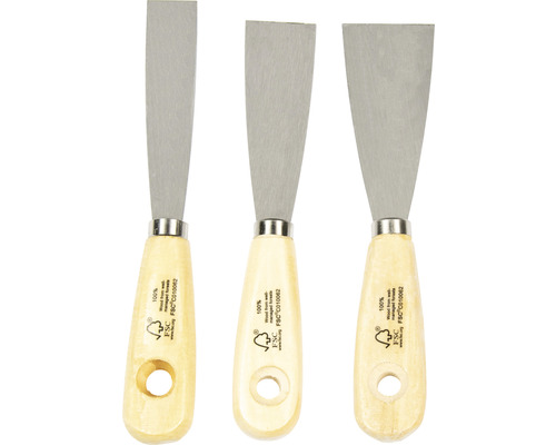 Tre spacklar med trähandtag och metallblad