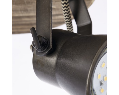 Detalj av justerbar LED-spotlight med metalldetaljer