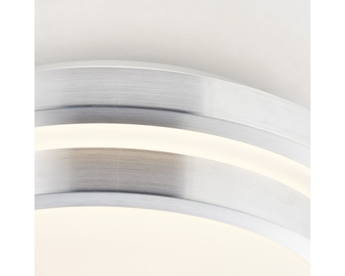 Närbild av en rund taklampa med integrerad belysning