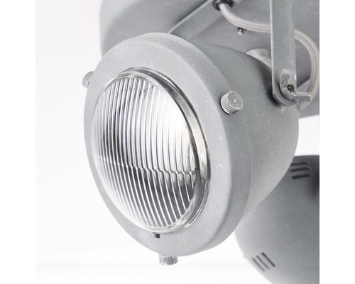 Närbild av en grå strålkastare med transparent skyddsglas för inomhusbruk