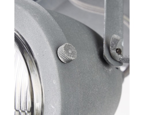 Detaljvy av en utomhuslampa med ställskruv för justering