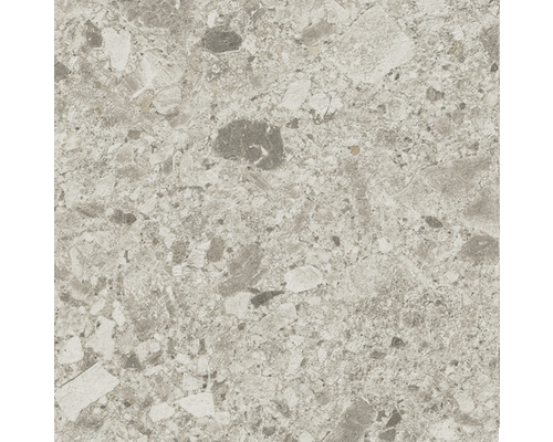 Närbild av en golvplatta med stendekor