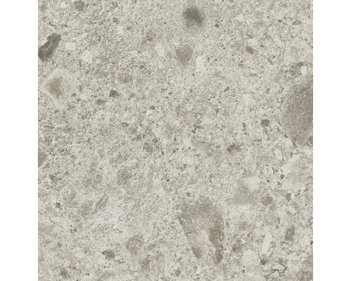 Närbild av en golvplatta med steninredning