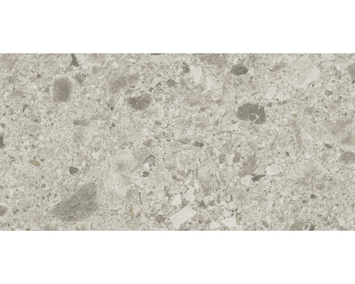 Närbild av en golvplatta med steninredning