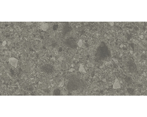 Närbild av en golvplatta med stendekor