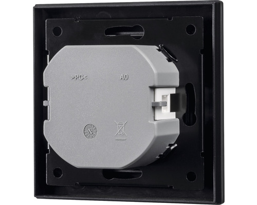 Baksida av en elektrisk insats med en svart ram