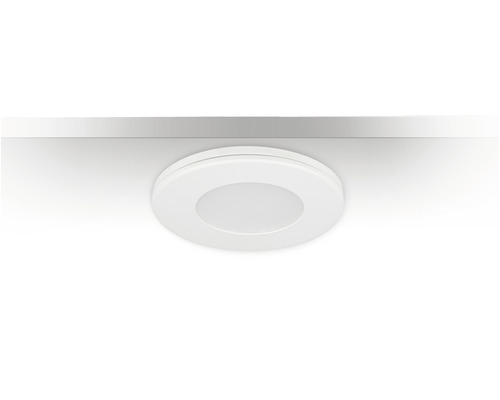 Rund infälld lampa i ett tak