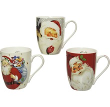 Tre kaffemuggar med jultomtemotiv