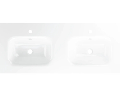 Två vita tvättställ för badrum