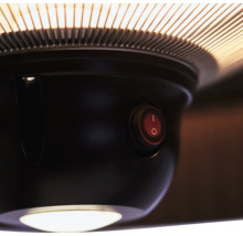 Detaljbild av en värmelampa med strömbrytare