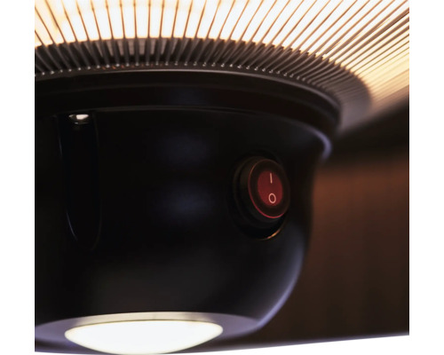 Detaljbild av en värmelampa med strömbrytare