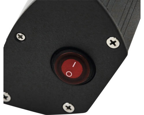 Detaljvy av en enhet med en rund strömbrytare