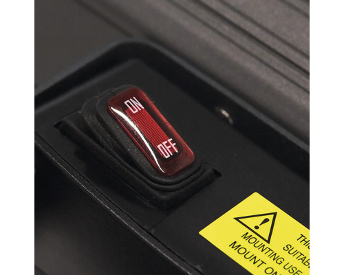 Detaljvy av en strömbrytare med lägena på och av