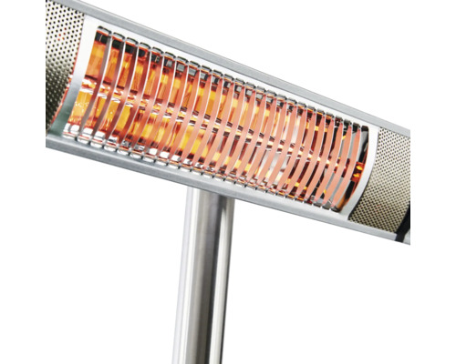 Detaljvy av en utomhusvärmare som är påslagen.