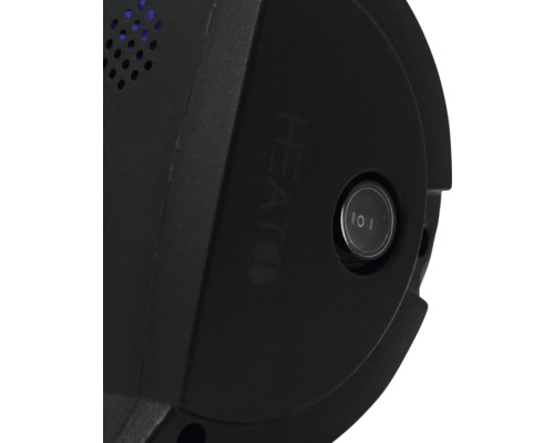 Närbild av en svart värmare med kontrollpanel och strömbrytare