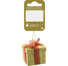 Gyllene present som julgransprydnad med rött band