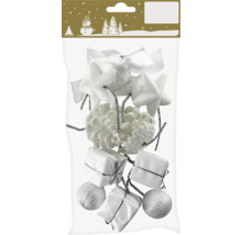 Förpackning med julgransdekorationer i olika former