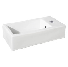 Vitt keramisk handfat med kranhål