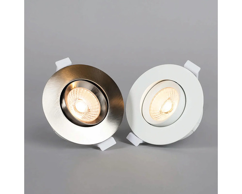 Två runda infällda spotlights i metall