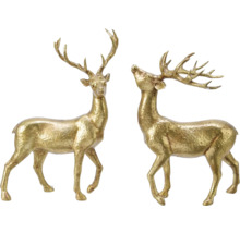 Två gyllene hjortfigurer som dekoration