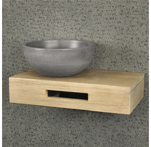 Tvättställ av betong på en trähylla