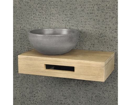 Tvättställ av betong på en trähylla