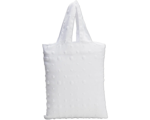 Vit tygkasse med handtag och upphöjt prickmönster