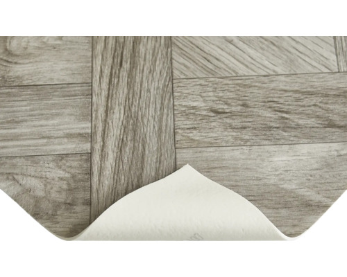 Vinylgolv i trälook med lossat hörn