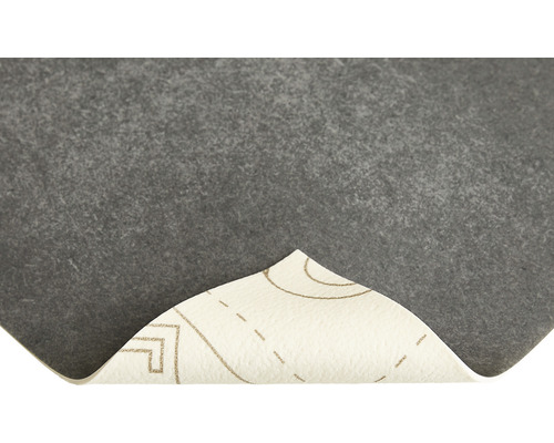 Grå filtmatta med mönster på undersidan