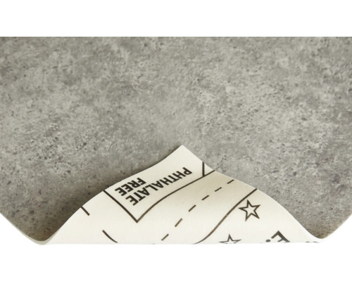 Grå golvplatta med information ftalatfri