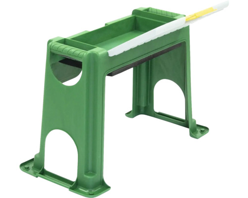 Grönt färgställ med färgskrapa