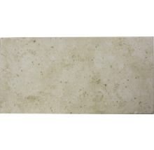 Keramisk platta med spräcklig yta