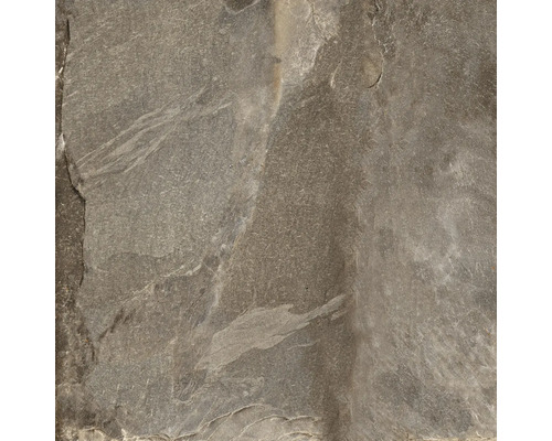 Närbild av en golvplatta i natursten