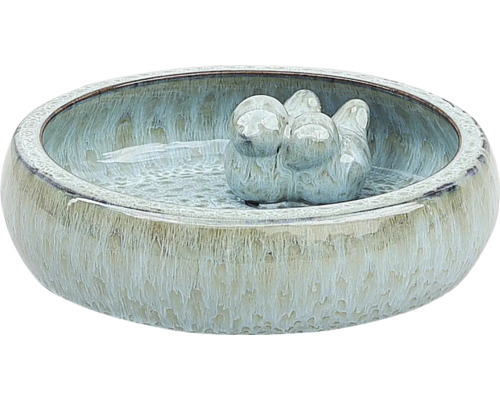 Keramisk fågelbad med fågelfigur